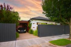  108 Eskdale Rd Caulfield North VIC 3161 $1,550,000 - $1,650,000 Superbly renovated, spacious open plan living with impressive indoor/outdoor connection and surprising tranquillity. This brilliant property contains 3 generous double bedrooms, all with impressive integrated storage, 2 newly updated bathrooms, and an excitingly large open plan kitchen/living/dining space surrounded by lush gardens. This Art Deco classic with a modern extension will impress with its space and privacy. No detail has been overlooked, from the lovingly restored original ornate ceilings, gorgeous hallway with custom bookcase and the marble mantle open fireplace, through to the full height picture window that impresses guests on arrival. In the modern, light filled and expansive family bathroom you'll find a gorgeous freestanding bath, marble vanity, substantial storage, and European laundry. The amazing chef's kitchen with stainless steel bench-top, extensive storage, concealed fridge/freezer and pantry spaces, Ilve 900mm stove, Qasair extractor range, integrated Miele dishwasher, a Carrara marble topped movable island bench will excite the senses, and the chef in the family. Double glazed doors open into the north facing outdoor oasis that includes a readily accessible and plentiful kitchen garden, while the light filled living space adjoining is also easily openable to the lush surrounding gardens and wrap around deck. The highest quality finishes have been used throughout, Carrara marble, designer lighting and double-glazed commercial grade glass, and a year-round climate control via zoned, refrigerated, ducted cooling and heating give this exceptional home an unmistakable edge. Outside garden lighting, extensive sprinkler system, dual water tanks and an automatic gate leading to secure parking for two cars including an open garage with concealed shed and workshop spaces ensure a complete hassle-free and hands off lifestyle. This highly convenient locale gives quick access to Caulfield station, tram, and bus services, is a short walk to Caulfield Park, and within an easy distance of the various private schools in Caulfield and surrounding suburbs. 