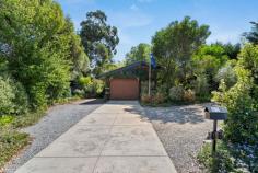  85 Sunnymeade Dr Aberfoyle Park SA 5159 $545,000-$575,000 Neighbouring a park and with Monaro Reserve and playground directly across the road, this loveable ‘70’s split-level home is in a truly unbeatable location. Central to the CBD, Hallett Cove, McLaren Vale and the Hills, everything is accessible from Aberfoyle Park. Closer to home, bus transport (almost on your doorstep), local shops and schools and a wealth of nearby reserves will make this a favourable spot for families. You’ll never get tired of coming home, welcomed by a wonderful open living and dining space over two levels upon entry. Impossibly high raked ceilings combined with a myriad of skylights mean natural light always reigns here, while a feature gas fireplace and split system air conditioners ensure year-round comfort. Bright and white with a heap of storage and bench space as well as gas cooktop and rangehood, the well-lit kitchen is exceptionally functional with plenty of room for helping hands. All equipped with built-in robes and skylights, three bedrooms begin with a lower-level master with ensuite bathroom, while bedrooms two and three are positioned on the upper floor with easy access to a central main bathroom with bath and convenient separate w/c. Outside, a private covered alfresco is bordered by a sea of lush gardens, with a paved area and strip of lawn offering extra outdoor space for entertaining or little legs. A few of our favourite things: – Beautifully subtle timber frontage concealed by thriving well-established gardens – Northerly aspect rear yard – Ceiling fans to bedrooms 1 & 2 – A generous carport with roller door + wide driveway with plenty of off-street parking – Stunning scenery with gorgeous gardens in every direction So well-loved with that rare ‘feels like home’ first impression. Live on the bright side of life on Sunnymeade Drive. 
