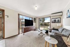  1/26 Bottrill Street Bonython ACT 2905 This desirable home contains all the key elements for young families considering their first home, or for those seeking to downsize. 1/26 Bottrill Street is well-presented and maintained and sits just moments away from local nature reserves and walking trails, Lake Tuggeranong, South.Point shopping precinct, local schools and public transport. A lovely dual occupancy home on a flat, low maintenance block, offering three bedrooms, two with built in wardrobes; a light filled bathroom with shower, bathtub and separate toilet; and a functional kitchen with freestanding electric stove. The open plan living area is light and airy and offers direct access to a small outdoor deck and fully enclosed backyard, large enough for small pets or children to play but without the ongoing maintenance. Be quick to inspect, you won't want to miss your first step to a new, relaxed lifestyle! Features include: Freestanding, single level dual occupancy home Well maintained and presented Separate title, no body corporate fees Ideal for a young family, couple or downsizer Three bedrooms, two with built-in robes Open plan living and meals Practical kitchen with electric upright cooktop Light filled bathroom with bathtub and separate toilet Large laundry with built-in storage and external access Reverse cycle split system plus electric wall heater Blinds on all windows, carpet, and tiled wet areas Small outdoor entertaining deck off dining room Instantaneous gas hot water system, metered separately Private, low maintenance grounds, Colourbond fencing Single attached garage with vehicle access to backyard Plenty of additional off-street parking. 