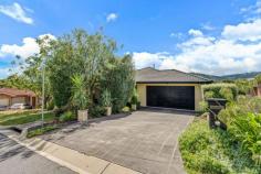  18 Slavin Place Gordon ACT 2906 Situated in the heart of Gordon on a quiet, elevated street is this spacious four bedroom home. With sweeping views across Tuggeranong Valley, and a nature reserve bordering Murrumbidgee River within walking distance, this is a fantastic opportunity to secure a peaceful property with all the conveniences a family needs. Privately set back from the street behind a lovely established garden, the interior features a large L-shaped living and dining room which opens out to a spectacular deck for entertaining. At the heart of the home, the kitchen comes complete with stone benchtops, gas cooking, loads of storage, and high end stainless steel appliances. The adjoining family room has ample space for comfy couches and a study nook, and boasts stunning views with access to the rear deck. Parents will love the large and light main bedroom with walk in robe and ensuite. Bedrooms two and three have built ins, while the segregated fourth bedroom is ideal as a home office or guest room. You'll want to spend all your time on the elevated deck, sipping a coffee or glass of wine as you watch the sun rise and set over the valley. The low maintenance backyard is fully fenced for privacy, with plenty of grassed area to kick a ball around. Features: Quiet, elevated street Stunning views Lovely established front garden New downlights throughout Freshly painted and carpeted L-shaped lounge and dining room Kitchen with stone benchtops, high end appliances Spacious family room Main bedroom with walk in robe and ensuite Three additional bedrooms, two with built ins Main bathroom with spa bath and new vanity Heated towel racks and new taps, showerheads in both bathrooms Ducted air conditioning throughout Laundry with external access Stunning rear deck (freshly painted) with views Fully fenced, low maintenance rear yard 5000L rainwater tank 10kw solar, long warranty Electric hot water to take advantage of solar Workshop Double lockup garage Walk to nearby reserve and Murrumbidgee River Minutes to Lanyon Marketplace Short drive to Tuggeranong. 