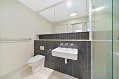  31/47 Wentworth Avenue Kingston ACT 2604 $460,000+ Treat yourself to easy-care living with this sublime inner south apartment. Step inside where a light-filled and open-plan layout awaits. A quality kitchen, with gas cooking and a drawer dishwasher, flows into the living room where air-conditioning promises year-round comfort. Sliding doors open out to the huge balcony with a beautiful leafy outlook ready for you to sit back with a coffee in one hand and a good book in the other. There’s plenty of space for a dining suite and a BBQ as well, perfect for dining alfresco throughout the summer. The bedroom is filled with natural light and enjoys easy access to the bathroom. There is also a study nook, with a built-in desk, for those who work from home. A brief on the Viridian complex, it was designed by Rodney Moss from Cox Humphries Moss firm, incorporating glass panels created by Australian/Japanese artist Keiko Amenomori-Schmeisser. The design incorporates landscaped courtyards with grassed areas, deciduous shade trees, mass plantings & two cooling fern gardens. The native plants complement exotics and birds that nest in the gardens, there is also a community herb garden run by the residents. This must-see apartment is located within walking distance of the Kingston Foreshore with a host of cafes and restaurants to discover. Mornings can be spent strolling around Lake Burley Griffin and you are also close to all the services you could need from major retail hubs to public transport and more. Or wrap up the day down Eastlake parade with a drink at any one of the popular bars or restaurants then simply make your way home in a couple of minutes to retire for the day. The Owners’ Favourite Part: Great location in Kingston! Features include: – Large sundrenched open plan lounge/dining area – Living area opens to a beautiful full-length balcony – Kitchen equipped with gas cooking & integrated dishwasher – Stone benchtops, ample storage, microwave space – Convenient Study area away from the living space – Well-appointed bathroom with European Laundry – Reverse-cycle air conditioning unit in the living area – Intercom, storage shed, 1 car space, remote basement – Open-air tranquil & mature internal common courtyards – Perched on level 3, secure, safe, single-level apartment living. 