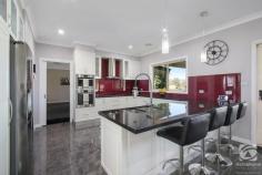  54 Bullington Way Baranduda VIC 3691 $1,350,000 Located in the picturesque Baranduda Valley, only minutes from town, this spacious home was built with the growing family in mind. With its inviting street appeal, this owner-built, 2013 steel-framed home is situated on 5 acres and offers a total lifestyle package. Designed for those who enjoy entertaining, the contemporary kitchen is complete with a central benchtop, ample storage options, twin wall & steam oven, and a large walk-in pantry. The two luxurious living areas with a naturally flowing floor plan ensure a seamless transition to the kitchen and dining areas, bringing the whole family together, while still ensuring there is a quiet space for everyone. Comprising of four generous bedrooms, the master with a huge walk-in robe and ensuite, you will never be short on space! The rumpus room positioned at the far end of the home provides for flexibility of use. This room could serve as a third living area for a long-term guest, a home office/study, or a children's playroom. Indoor-outdoor living and dining are made easy, with the outstanding 7x6m covered alfresco area opening directly off the dining room, providing a great space for those summer nights and weekends spent with family and friends. This property truly embraces the countryside's private tranquil lifestyle, while still only being 10 mins drive to town. Enjoying city conveniences, with all town services connected, plus two water tanks to irrigate the lovely garden beds. In addition, there is a 12x12m shed with three-phase power, a mezzanine, and an extra high central roller door to store all the family toys, hay shed, and fenced paddocks. Inside, satellite NBN ensures your ability to work/study from home, while R5 insulation batts and double glazed windows in the living area assist the ducted heating and cooling to ensure your comfort year-round. Become a part of the coveted Baranduda community, and enjoy all of the amazing facilities available to you, such as shops, schools, and walking trails. Life doesn't get much better than this! Please call to arrange your inspection time. 