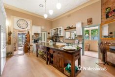  9 Gray Street Corowa NSW 2646 $799,000 This stunning Federation home built from 1898 to 1906 affords the new owner many options on this 1,056m2 approx. block. The traditional 4-bedroom home offers a spacious country kitchen with a 900mm freestanding cooker, walk in pantry, where the family can cook up a storm on the 3m central timber bench, and is afforded great storage in this inviting kitchen, the two separate spacious living rooms enjoy timber ceilings and lovely views, the breakfast room off the kitchen leads onto the verandah, the study comes off the rear landing and the master bedroom with ensuite and walk in robe has a separate entrance off Gray St, and a parking spot, the spacious renovated family bathroom is central to the bedrooms, the separate laundry is close by the kitchen making this a functional design, the double garage and potting shed and workshop area are all to the rear of the home and come off Parade Place. The charm of yesteryear abounds in this beautiful home where the amazing 12-foot ceilings, leadlight and stained-glass windows, metal pressed ceilings, large cornices, Murray River Gum polished timber flooring and spacious verandah will immediately impress. The home has been recently painted inside and out, and totally restumped. The outdoors offers alcoves for the family to relax and take in the leafy shaded areas to enjoy barbeques, with a serene pond, ready to watch the world go by from the wide verandah. Your climate is controlled by underfloor gas heating and an ambient gas heater to the living room, the cooling is assured with fans and split systems. The property also comes with a self-contained unit, offering an income stream of $175p.w. or additional space for the family, with one bedroom, kitchen, bathroom, lounge room and separate carport. 