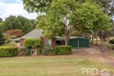 1916 Adelong Road Tumblong NSW 2729 Positioned on an extremely generous allotment and with absolute creek frontage, sits this versatile family home with multiple living areas and fourth bedroom option, only a few moments' drive to the Hume Highway both North and South bound. With a very flexible floorplan and large fully established grounds and additional paddock with creek frontage, all encapsulated over 5 existing lots, this cottage inspired residence is a lifestyle opportunity not to be missed. Call today to book your private inspection. Premier Features: - Three great size bedrooms with the master positioned to one end of the plan - Large bathroom with combined laundry, boasting separate built-in bath, separate shower and single vanity - Eat in style kitchen with direct external access, positioned as the hub of the home and boasting huge bench space and storage options - Main formal living area positioned to one end of the plan - Second living area positioned to the rear of the home with external access to quaint covered entertaining area and access from the side verandah, with wood box fire heating - Open plan dining area - Additional study or sunroom area privately positioned to the rear of the plan and overlooking the garden - Double bay shed with ample power and concrete flooring - Quaint bullnose verandah on two sides of the home - Additional functioning outside toilet - Rainwater tanks and permanent pump line from the creek - Bore water and pump - Separate paddock with creek frontage - Large house grounds with mature trees and landscaping throughout - 9,745m2 block already on multiple allotments. 