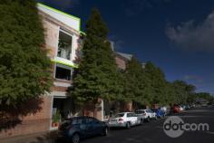  321/14 Milford Street Islington NSW 2296 This sophisticated residence located in the sought after complex ‘Soque Warehouse Apartments’ showcases double height ceilings, beautiful leafy views, and spacious design in a New York loft style close to shops, cafes, and the marina. Positioned on the top floor, the apartment features three bedrooms, two bathrooms, one secure car space, built in robes, covered outdoor space, ample storage throughout, on-site manager, mezzanine level, and a café in the building. As you step into the building’s foyer, you will get a sense of the quality and grandeur that awaits you. Head through the front door of the apartment and you will be welcomed in with dramatically high ceilings, light filled space, and a gorgeous open plan design. Entertaining family and friends is easy from the central kitchen overlooking the entire living space that flows directly out to the loggia. This is the perfect place for alfresco dining while you enjoy tranquil leafy views across the surrounding rooftops. The master bedroom is truly a haven with high ceilings, walk in robe, and a private ensuite. The second bedroom as well as another bathroom and laundry are on the main floor while upstairs, the huge third bedroom has its own mezzanine level with oodles of light flooding in from across the void. Located in an exclusive area of Islington, the home is within walking distance from shops, parks, public transport, and cafes, while the water is just a flat 10 minute walk away. This apartment is more than just a place to live, it offers a fabulous lifestyle that only some of us can dream of. Drenched in character and style in a highly coveted location, this opportunity will not last long. Call today; interest is anticipated to be high! 