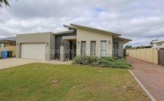  16 Woody Avenue Castletown WA 6450 $620,000 This sizeable family home commands your inspection! Fantastic family living zones include open plan living area, theatre room and activity zone set amongst 3 minor bedrooms. Master bedroom enjoys ensuite, WI Robe and parents retreat. Separate office, reverse cycle aircon and wide entrance hallway. Internal access via double garage. Rear timber deck overlooks pleasant garden setting and the home has the added benefit of vehicle entry through to the rear. Opposite public open space and around the corner from Primary school. 