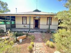  24 Halliday St Manmanning WA 6045 $99,000 This property is located in the beautiful country side of Manmanning, and just 201kms from Perth & would make the perfect weekend getaway. The home itself comprises of 3 bedrooms, 1 bathroom, lounge room with a fire place, a second living area, dining room, kitchen and laundry with high ceilings throughout plus a store room off the veranda. Sitting on 2001m2, there is plenty of room for the kids or dog to explore & roll around on the lawned backyard. There's also a raised veggie garden, chicken coop, established gardens and 2 garden/storage sheds. The home will need some work, this includes the ceilings, bathroom - still functional, a new stove and the wooden veranda will need some attention. This property has a lot of potential and perfect for the creative handyman or woman who is happy to tinker then enjoy the fruits of their labour. With the considerations of some TLC this property is priced at just $99,000. Rates are $500 approx (this contains land rates and Emergency services levy). For more information please contact Jessica 0456 147 647 or Chloe on 0419 920 418. 