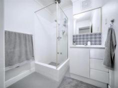  6/125 Alexander Drive Dianella WA 6059 $299,000 Stylishly renovated from top to bottom, this stunning 2-bedroom apartment lies in a well-maintained complex of only 8 in the heart of Dianella. With Dianella Plaza, Terry Tyzack Aquatic Centre and several parks all within easy reach, plus the ECU Mt Lawley & CBD bound bus stop directly across the road, its ideal for first home buyers, downsizers, students and investors alike! Move-in ready with nothing to spend or do, warm timber look flooring and a crisp neutral colour palate work in harmony to create a bright and airy feeling. Enjoying a lush green outlook over the surrounding treetops, the open plan kitchen, meals and living area is the main hub where most of your time will be spent. Recently renovated to include stainless steel gas cooktop and oven, plenty of cupboard space and a large fridge freezer recess, the chef’s kitchen is bound to inspire the culinary inclined. Generously proportioned with space for seperate living and dining areas, an oversized front window floods the room with gorgeous natural light, whilst the split system A/C ensures year-round comfort. Off here you also have a quaint front balcony, the perfect spot to sit back and enjoy a morning cuppa. The master bedroom is of a generous size and also enjoys a beautiful green outlook, whilst the second bedroom is a versatile space that could be configured as a guest room, child’s room or home office. The centralised main bathroom is brilliant in its simplicity and features a sleek white vanity with built-in storage plus shower. Practically designed for everyday living, the W/C is separate. Another feature worth noting is the excellent storage space for an apartment of this size. Not only do you get large built-in robes to both bedrooms, but a floor to ceiling pantry in the kitchen and a separate linen closet in the hallway. Location wise, they don’t get much more convenient than this! Dianella Plaza is only 500m away (approx.), whilst Morley Galleria and Coventry Village are not too far by car. For those who enjoy an active lifestyle Breckler Park and Dianella Regional Open Space are both within easy reach, as too is the Terry Tyzack Aquatic Centre straight down Alexander Drive. And best of all, the ECU Mt Lawley & CBD bound bus stop is directly across the road, with the latter being only 7km away (approx.). Delivering homestyle and lifestyle in one, this stunning apartment won’t last long, so don’t delay and express your interest today! Additional Features: • Well presented group of only 8 • Security cameras to the common areas • Separate communal laundry • One allocated parking bay plus visitor bays. 