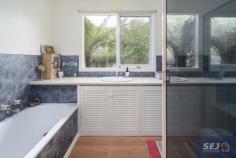  335 Hazel Park Rd Welshpool VIC 3966 $785,000-850,000 Complete privacy surrounded by approx. 4.8 acres of land with a long tree lined driveway leading you home. Charming residence amidst picturesque rambling cottage gardens, orchard, vegetable patch, 4 fenced paddocks and excellent shedding. With wide verandahs on two sides there is always somewhere to sit and catch the sun, listen to the birds, enjoy the peace and quiet. Pretty entrance foyer leads into the spacious open plan interior with easy care polished flooring. The ambience of a wood heater is combined with the convenience of RC/AC to ensure comfort in every season. Every window enjoys views of the stunning garden setting, bringing the outside in to connect you with nature. Modern kitchen with quality appliances, huge walk in pantry and island bench / servery to dining area. Light filled sunroom / studio space or study. Three double sized bedrooms, family bathroom, laundry / utility room and separate w.c. Minimal running costs with solar and mains power and solar hot water. Shedding includes a 3 bay lockable shed with concrete floor, lights and power plus a 3 bay extra height, chook pen, disused dairy and hay shed. Excellent water storage. Quiet rural location just 8 minutes from Agnes Falls with Toora (7 minutes) and Welshpool (8 minutes) a short sealed drive away. 