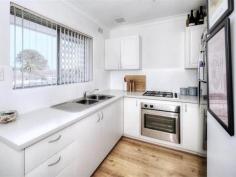  6/125 Alexander Drive Dianella WA 6059 $299,000 Stylishly renovated from top to bottom, this stunning 2-bedroom apartment lies in a well-maintained complex of only 8 in the heart of Dianella. With Dianella Plaza, Terry Tyzack Aquatic Centre and several parks all within easy reach, plus the ECU Mt Lawley & CBD bound bus stop directly across the road, its ideal for first home buyers, downsizers, students and investors alike! Move-in ready with nothing to spend or do, warm timber look flooring and a crisp neutral colour palate work in harmony to create a bright and airy feeling. Enjoying a lush green outlook over the surrounding treetops, the open plan kitchen, meals and living area is the main hub where most of your time will be spent. Recently renovated to include stainless steel gas cooktop and oven, plenty of cupboard space and a large fridge freezer recess, the chef’s kitchen is bound to inspire the culinary inclined. Generously proportioned with space for seperate living and dining areas, an oversized front window floods the room with gorgeous natural light, whilst the split system A/C ensures year-round comfort. Off here you also have a quaint front balcony, the perfect spot to sit back and enjoy a morning cuppa. The master bedroom is of a generous size and also enjoys a beautiful green outlook, whilst the second bedroom is a versatile space that could be configured as a guest room, child’s room or home office. The centralised main bathroom is brilliant in its simplicity and features a sleek white vanity with built-in storage plus shower. Practically designed for everyday living, the W/C is separate. Another feature worth noting is the excellent storage space for an apartment of this size. Not only do you get large built-in robes to both bedrooms, but a floor to ceiling pantry in the kitchen and a separate linen closet in the hallway. Location wise, they don’t get much more convenient than this! Dianella Plaza is only 500m away (approx.), whilst Morley Galleria and Coventry Village are not too far by car. For those who enjoy an active lifestyle Breckler Park and Dianella Regional Open Space are both within easy reach, as too is the Terry Tyzack Aquatic Centre straight down Alexander Drive. And best of all, the ECU Mt Lawley & CBD bound bus stop is directly across the road, with the latter being only 7km away (approx.). Delivering homestyle and lifestyle in one, this stunning apartment won’t last long, so don’t delay and express your interest today! Additional Features: • Well presented group of only 8 • Security cameras to the common areas • Separate communal laundry • One allocated parking bay plus visitor bays. 