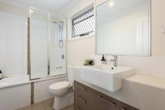  2/38 Franklin Street Nundah QLD 4012 Imagine this: a stylish three-bedroom townhouse located in a peaceful, pleasant street, close to everything, with NO BODY CORPORATE FEES. Welcome to 38 Franklin Street. Set to the rear of an established block of just four high-quality homes, 2/38 offers space and delightful quiet. Forget shared doors and common walls - these modern townhouses are free-standing. Drive straight in to the secure, remote-controlled garage that leads directly into the house. Downstairs is airy and bright, and tiled throughout. There's an excellent two-pac kitchen with island bench and loads of storage. Relax in air-conditioned comfort in the large living/dining area which flows to a private and fully-secure back garden surrounded by mature trees. There's a downstairs powder room and full laundry on this level. Upstairs, there are three fully-carpeted bedrooms with built-in robes. The main bedroom has a full en suite, air-conditioning, and a spacious walk-in robe. The modern main bathroom features a full bath and built-in cabinetry. The location is quite simply excellent. It's a pleasant, flat walk from Franklin Street to bustling Nundah Village and Nundah train station (20mins). There's wonderfully easy access to the Sunshine and Gold Coasts via the Gateway Motorway. A minute's drive puts you onto major routes to the CBD, airport and beyond. If you're looking for comfort and privacy in a great location, or keen to secure a solid investment, don't miss the opportunity to inspect this lovely, well-maintained townhouse. Best of all: there are NO BODY CORPORATE FEES! 