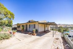  71 Eagle Street Gundagai NSW 2722 $435,000 Huge 2023m2 block 3 bedrooms plus office or sitting room 3 rooms with built ins Separate living and dining areas Renovated eat in kitchen Internal laundry with separate toilet Fully renovated bathroom with bath Carport with direct undercover access to the house Covered outdoor entertaining area capturing the gorgeous views This property has all options covered for any type of purchaser - great family home, very easily maintained investment property or build your dream home on the large block & capitalise on the amazing views! 