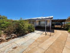  28 Richards Street Carnarvon WA 6701 $180,000 This 3 Bedroom 1 bathroom Home on 809 sqm land area offers the opportunity to get into the Real Estate Market at an affordable level. All the fundamentals are in place and with modernization and upgrading this can be an excellent investment. There are three bedrooms, lounge, dining, kitchen, bathroom, toilet, and an enclosed back veranda the total length of the house. Outdoor there is a Carport, Workshop, outdoor Laundry with extra shower and toilet, solar hot water, paved driveway, and the property is connected to sewerage. 