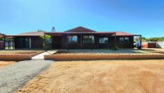  1006 North West Coastal Highway Carnarvon WA 6701 $590,000 If you are looking for room to move both inside and out this is the Property for you. 4-bedroom, 2-bathroom Country Style Home with all modern fittings 2 large living areas, kitchen with walking in pantry, the main bedroom with ensuite including a spa, built in robes, the other 3 bedroom are all a decent size with build in robes, a second bathroom, laundry, and toilet. The property has air-conditioning throughout. There is a front veranda plus a full-length covered Veranda at the rear of the house with large concrete areas for entertainment plus undercover parking The Property has had a recent freshen up and is looking excellent. There is an expectantly well-appointed Shed /Workshop in place comprising of 115m2 floor area with 2.8 metre door height and 2.9metres wide. Plenty of room to store the boat, caravan and still have space to spare. The Land area is 4029m2 and all the improvement are placed to take advantage of the balance of the area. 