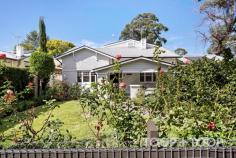  5 Ringarooma Avenue Myrtle Bank SA 5064 $1,800,000 - $1,980,000 Presenting the classic façade of the 1920s, the wide gables, shady verandah with white rendered walls and set in a pretty tranquil garden setting, this substantial family home is distinguished by magnificent accommodation over two discreet levels, perfect for the large or blended family. Boasting an awesome extension and multiple spaces for indoor to outdoor living, this is a home filled with warmth and personality. Entering the home admire the traditional hallway, decorative ceilings, fireplaces and rooms of generous proportions. There is a sense of sympathetic contemporary with a neutral colour palate, plantation shutters and polished floorboards. To the front of the home a lounge and study make for perfect parent spaces with views to the established front garden. The master bedroom suite offers a tranquil outlook through glass doors opening to the covered courtyard garden while another downstairs bedroom is also light-filled and a generous size. Upstairs two further double bedrooms share a three-way bathroom and an awesome family room offers space for study, media, games or just relaxing. Offering five bedrooms with ease, there is huge storage to match the substantial size of the home and potential to flexibly use other spaces. Spacious dimensions and superior features carry through to the fabulous extension. The kitchen overlooks the casual living and dining areas with glass on all sides. Spaces flow easily from indoors to out with an all-weather pavilion and outdoor kitchen. A courtyard created off the garage is perfect for additional outdoor living, while the original garage is set up for a great workshop or studio. There is perfect space and accessibility for a pool in the established garden to the rear if desired. With a pavilion and outdoor entertaining already in a spot to overlook a pool this may complete what is already a superb package. Be spoilt at this address only a short distance out from the city with excellent local shopping, restaurants and cafes. For families, the home is zoned to Highgate and Glen Osmond Primary Schools as well as Unley High, with a number of further excellent options for private schooling in the near vicinity. Enjoy space to move. Be inspired by something with exceptional offerings. In detail: - Built 1920, renovations in 2002 - Traditional features: fireplaces, polished wooden floorboards, decorative ceilings - Master bedroom suite: walk-in robe with generous cabinetry, good-sized ensuite with double vanity, feature fireplace, direct access to paved courtyard - Kitchen: stone tops, breakfast bar, Delonghi gas burner cooktop & electric oven, exhaust, Bosch dishwasher, plumbed for fridge - Generous storage: under-stairs storage, BIRs to bedrooms, attic under-roof space accessed from upstairs landing, extensive cabinetry to kitchen, workshop - Laundry: access to outdoor kitchen/ entertaining & services - Outdoor kitchen: remote-controlled adjusting pergola, plumbed for gas, exhaust canopy, wine fridge - Fold-back doors, phantom screens to entertaining area - Pavilion with deck, screens & blinds - Garden shed, hen house - Ducted evaporative cooling. flame gas heater to informal living - Security cameras - Garage: side-by-side 2x2 for four vehicles & more, remote entry - Extensive rainwater tank storage, plumbed to laundry & bathroom - Solar array. 