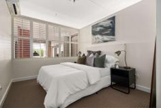  225/64 Macquarie Street Teneriffe QLD 4005 Perfectly positioned on the front corner of the Ansonia Woolstore, Unit 225 benefits from the best of both worlds: Views of the Brisbane river to the East and a leafy outlook onto Beeston Street through the Northern aspect. The living and dining area is bathed in natural light from dawn until dusk, while the elevated bedroom offers optimal privacy thanks to tasteful plantation shutters. An industrial galley-style kitchen makes optimal use of the space, blending into the living and dining area, without compromising on convenience or appearance. Retaining the sought-after features of its historic past, this Woolstore apartment boasts hardwood floors, timber beams, an exposed ceiling and solid brick walls. Perfect for individuals and couples, this 80 square metre one-bedroom apartment is the ideal base to explore all Teneriffe and Brisbane have to offer. Stroll down the tree-lined streets to enjoy the various cafe and dining options available, follow the Riverwalk to New Farm or Hamilton or catch public transport to go wherever you desire. With easy access to main roads, Brisbane Airport and major motorways are only minutes away by car. Don't miss this fantastic opportunity to secure a property in the hottest sector of the current market! PROPERTY FEATURES • One Bedroom • One Bathroom • One Car Space • 80 SQM • River Views • Premier position on the front corner of the building, offering an additional window BUILDING FEATURES In-ground heated pool Equipped gym Sauna BBQ & Recreational facilities Pet-friendly complex Secure car park Secure off-street visitors parking Located on the first level with elevator access Intercom entrance system 24 hour CCTV monitoring Onsite manager Unaffected by 2011 & 2022 floods SUBURB FEATURES • A multitude of cafés, restaurants, bars and specialty shops • Walking distance to CBD, Gasworks Precinct, James Street and Fortitude Valley • Walking distance to Riverwalk, New Farm Park and Howard Smith Wharves • Easy access to ICB & Kingsford Smith Drive, M7 and Airport Link • 4 km to CBD • 10 km to Brisbane Airport • 2 km to Bowen Hills Train Station • New Farm State School Catchment zone • Holy Spirit Primary School New Farm. 