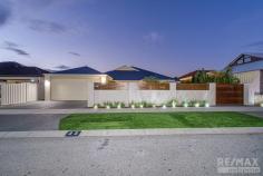  22 Ammanford Cres Butler WA 6036 $600,000 This immaculate family home has the WOW factor and needs to be seen to be appreciated! You will be blown away with superb quality of fixtures and fittings throughout the property. Welcome to this Ultra-Modern – totally renovated family home, which is safe and secure in a quiet location with a lovely park 100m down the street. You are close to schools, shops, parks, the Butler Train station and all amenities. Features of the home: • Huge master suite is secluded at the front of the home with a study/nursery and WIR. Private luxurious en-suite completed with frameless shower, 1800mm free standing bath, double floating vanities, and separate W/C • Separate bedroom wing encompasses 3 large bedrooms with WIR’s sharing the family bathroom completed with frameless shower, 1800mm built-in bath and floating vanity • Mom will fall in love with the Chef’s kitchen with LED strip lighting, plenty of cupboards & bench space, stone bench-tops with waterfall edge, 900mm stainless steel appliances, double fridge recess and corner pantry • Sit back, relax and watch your favourite movie in the theatre room with mood lighting • The large open plan living, and dining areas flows to the games room and alfresco area • Games room is fitted with a bar with essa stone benchtop and bar fridge nook • Enjoy BBQs with family and friends under the timber lined alfresco with TV & aerial point, gas bayonet and feature fireplace • Splash away in your heated 8m saltwater pool with stone waterfall Some of the extras Include: • Double remote garage (29C) with built in storage & overhead cupboards • 6.6kW solar system • 14kW Zoned ducted reverse cycle aircon • Access and additional parking for trailer / camper van / boat • Full CCTV system with audio recording & security sensor lights to the front of the property • Quality stone features, top quality carpets, porcelain tiles, roller blinds • Brand new hybrid waterproof marri flooring & skirting boards • Wide entry with 30C ceiling and 33C ceilings to living & games areas • Coffered ceilings in master bedroom and theatre room • Laundry with extra storage • Synthetic lawn in the front and back gardens • Security screens to front entry and minor bedrooms AND THE LIST GOES ON …. Built in 2005 by Ross North Homes on a 608m² block 