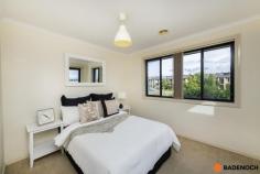  47A Mary Gillespie Avenue Gungahlin ACT 2912 Perfectly positioned in the sought-after suburb of Gungahlin, is this modern double storey, 4 bedroom townhouse, offering style and comfort within walking distance to the ever growing Gungahlin Village. As you enter the property, you will appreciate the well thought out floorplan, boasting three separate living areas, 2 located at the front of the home, and one large open plan kitchen/dining area with direct access to the lovely timber deck, creating for the perfect indoor/outdoor living opportunity. Upstairs, you are greeted with 4 generously sized bedrooms. The master bedroom offers a large modern ensuite and walk-in robe. The remaining 3 are all equipped with built in robes and are serviced by the main bathroom and separate toilet for convenience. Completing this ideal home is the easy-care, low maintenance front and back courtyard, complemented by a large timber deck ready to be enjoyed. A detached double garage is located to the rear of the property with the benefit of direct access to the back courtyard offering ultimate privacy. Within close proximity to the light rail, Gungahlin Marketplace and Mulligans Flat Reserve, Barton Highway and Federal Highway this home has something to offer to every lifestyle. Quality features of the property include: 4 bedroom townhouse Master bedroom with ensuite & walk in robe 3 separate living areas Built in robes to all bedrooms Modern kitchen with dishwasher Double garage with remote with direct access to back courtyard Ducted gas heating Timber deck provides a great escape to enjoy the sun Low maintenance private front and rear courtyard Central location to shops, public transport, schools and recreational Facilities. 