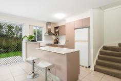 2/38 Franklin Street Nundah QLD 4012 Imagine this: a stylish three-bedroom townhouse located in a peaceful, pleasant street, close to everything, with NO BODY CORPORATE FEES. Welcome to 38 Franklin Street. Set to the rear of an established block of just four high-quality homes, 2/38 offers space and delightful quiet. Forget shared doors and common walls - these modern townhouses are free-standing. Drive straight in to the secure, remote-controlled garage that leads directly into the house. Downstairs is airy and bright, and tiled throughout. There's an excellent two-pac kitchen with island bench and loads of storage. Relax in air-conditioned comfort in the large living/dining area which flows to a private and fully-secure back garden surrounded by mature trees. There's a downstairs powder room and full laundry on this level. Upstairs, there are three fully-carpeted bedrooms with built-in robes. The main bedroom has a full en suite, air-conditioning, and a spacious walk-in robe. The modern main bathroom features a full bath and built-in cabinetry. The location is quite simply excellent. It's a pleasant, flat walk from Franklin Street to bustling Nundah Village and Nundah train station (20mins). There's wonderfully easy access to the Sunshine and Gold Coasts via the Gateway Motorway. A minute's drive puts you onto major routes to the CBD, airport and beyond. If you're looking for comfort and privacy in a great location, or keen to secure a solid investment, don't miss the opportunity to inspect this lovely, well-maintained townhouse. Best of all: there are NO BODY CORPORATE FEES! 
