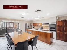  29 Derby Cres Chipping Norton NSW 2170 $1,575,000 A wonderful opportunity presents itself to secure a great family home on an even better block... and it's the first time on the market. Ever. The choice is simple; keep it all to yourself or explore the potential to subdivide (STCA) with a 30.9m frontage and generous 916sqm of land. The brick veneer home offers a neutral floorplan and presents itself as a blank canvas for the next owner; boasting four bedrooms with built-ins, ducted air conditioning, Multiple living and dining areas, kitchen with ample storage and a Double lock-up garage. Located within a quiet street in the middle of chipping Norton, within walking distance to schools, Shops, Public transport & recreational facilities 