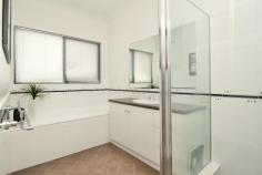  Unit 2/138 Lewington St Rockingham WA 6168 $569,000 Set in a quiet street and opposite a nature reserve, this stylish 4 bedroom (or 3 bedroom plus study) double-storey townhouse is also just two blocks from the Naval Memorial Park and some of the gorgeous beaches the city has to offer. With features galore including a tranquil outdoor wooden thatched gazebo with timber decking and weather blinds, this townhouse will exceed your expectations. Enter the home through double doors and be impressed by the porcelain tiling and high ceilings of the foyer which flows through to the main living area and kitchen. To the right of the entry is the 4th bedroom fitted with a built-in robe that could be utilised as a study. Head upstairs where you'll find the master bedroom with ensuite and walk-in robe, plus the two minor bedrooms, family bathroom, retreat and balcony. Outside, you will enjoy relaxing or entertaining under the large patio/gazebo which can be used all year round. Plus the handyman will love the outside storeroom which has been fitted with a workbench. Additional features include: - High ceilings throughout - Granite benchtops in kitchen - Ducted reverse cycle air conditioning - Downstairs laundry and powder room - French doors - Outdoor storage room - No strata fees - Common driveway 