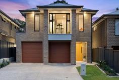  12 Richmond Road Hope Valley SA 5090 Meticulously designed and expertly crafted, this stunning modern home is an absolute show-stopper. Every inch of this remarkable residence exudes contemporary charm and style from the sprawling open-plan living areas to the high-end finishes, premium fixtures and lovely outlook over the surrounding area. A grand entry welcomes you inside where you are drawn through to the light-filled and spacious kitchen, meals and family room. Here, tall ceilings and large format tiles enhance the luxurious appeal of this awe-inspiring space while the kitchen is an avid foodie's dream come true. High-end Euro appliances offering gas cooking, a large island with dishwasher, stone benchtops and sleek cabinetry and lighting will make preparing meals an absolute joy. For convenience, downstairs you will also find a powder room and the large laundry with full length wall of storage plus overhead cabinetry, full length clothes airing rod and sweeping benchtop will have you actually looking forward to wash day! An upper-level retreat extends the living space even further and connects the three bedrooms including the master with a walk-in robe, a private balcony and a luxe ensuite with double rain showerheads. Bedrooms two and three are complete with built-in robes and easy access to the main bathroom with a freestanding tub, a separate rain shower and a powder room. Glass sliding doors connect the main-floor living space to the large covered alfresco including outdoor kitchen with sink, barbecue and fridge, where you can cater for and gather with loved ones and overlook the fenced backyard with room for the kids or family pooch to run free. Ducted air-conditioning, a security system and black taps, fittings, door handles and hardware throughout are just a few of the many extra features here. You can leave the cars at home in the double garage and walk to the nearby Korong Reserve, local bus stops and the Torrens Valley Christian School. Highbury Primary School is also within easy reach and you're just moments from Tea Tree Plaza, Modbury Hospital and Modbury Interchange offering easy access to the Adelaide CBD. 