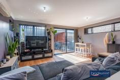  186 Dalmilling Dr The Vines WA 6069 $349,000 Elevated behind a white picket fence and a nature strip that broadens out to merge with a neighbouring park, this 3-bedroom 2-bathroom home is a picture of perfection. The 2020-built brick and iron residence uses an open plan living zone flowing into a sunny, north-facing courtyard to deliver seamless indoor-outdoor living. Nearby parks, walkways, and the Swan Valley’s gourmet delights offer an enviable lifestyle at home and away. 3 bedrooms 2 bathrooms 2020-built brick and iron Indoor-outdoor floorplan OP kitchen living meals Modern colour scheme Central courtyard garden Dble auto enclosed carport Reticulation front & rear 225 sqm “cottage” block Blue ribbon first home A limited palette of colours and materials, a floorplan where shared and private spaces are well defined and a central outdoor living zone fashion a home designed for contemporary living with a sense of welcome and ease. Three bedrooms sit at the front of the floorplan. Two juniors with plush carpet and a wardrobe recess are arranged on either side of a shared family bathroom featuring black tapware and an on-trend colour scheme. The principal bedroom features a pair of tall windows looking across the front garden and paved patio. Completing this oasis of calm is a walk-through robe opening into an ensuite with a shower, vanity, and WC. At the rear of the plan, an expanse of open living merges with a paved courtyard to expand the functional living space. Light-hued timber-look floors and an uber-cool palette of white and charcoal give this central living zone a modern edge. An island bench with an integrated breakfast bar, stone-topped benches and a 900 mm oven with a 5-burner hob will delight the most passionate of cooks. Reverse cycle air-conditioning delivers year-round climate control to the central living zone. The north-facing courtyard is open to the remote entry, 2-car auto enclosed carport. The extra-height carport has clearance for a 4 X 4 and is accessed via a rear laneway. Move-in ready, beautifully presented and a picture-perfect first home, this easy-care, easy-living property is not to be missed. 
