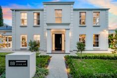  8B Evans Ave Mitcham SA 5062 $1,950,000 - $2,050,000 A Georgian-inspired crowd-pleaser with all the mod cons and a front row seat to Mitcham Reserve. Overlooking the boundless expanses of Mitcham Reserve, this imposingly beautiful two-storey salute to the Georgian residences of a bygone era revels in the newfound freedom, style, quality and push-of-a-button comfort of its comprehensive re-invention. Kudos to the current owner who spared no expense in taking the big bones of an Alan Sheppard creation and transforming them into a light, bright, airy and solar-powered 4-bedroom home that is both prolific and bold, yet understatedly classy. From its professionally landscaped low-care gardens, starring open-plan kitchen and Tasmanian oak floors down to the wiring, plumbing and every door and cornice, what looks and feels brand new from top to toe does because it just about is. Headlined by its high-end appliances, butler’s pantry and an expansive island topped with a 3.2m-long piece of stone, the kitchen is as much a stylish statement as it is a feat in functionality. If you include the entertainer’s patio with an electronic louvred Vergola and an eye on spring dinners, there are four living spaces to call on, one central to an upper floor with two bedrooms, a sleek fully-tiled bathroom and bragging rights for the kids. With a walk-in robe and ensuite, the main bedroom takes the honours in a home decked out in automated mod cons, whether it be the zoned ducted R/C, CCTV, or that bill-busting 6.6KW solar system, just to name a few. A timeless home with the modern way of life in mind. What’s left to think about? More to love: – Just a short stroll from Scotch College – All upgrades completed within the last 18 months – Spanning a wide street frontage, maximising its lush, park views – Double garage with epoxy floors, storage and automated doors to front and rear – Expanded front driveway (for three cars) – Ultra-flexible floorplan includes open-plan living and formal sitting room to ground floor – Landscaping includes aggregate concreting to home’s perimeter – Ducted R/C, ceiling fans and gas feature fireplace – Beautifully presented low-care gardens with mobile phone controlled lighting and watering – Hardwired CCTV with security lighting and motion detection – Storage galore includes built-in robes to bedrooms 1, 2 and 3 – The option to work from home in bedroom 4/office – Custom ‘s-fold’ sheer curtains throughout – Large laundry with custom joinery and stone benchtops – LED down lights throughout the home – Just a moment from the hiking trails of Brown Hill Creek, ‘The Ed’, Mitcham Square and cinema – Walking distance from public transport – And much more. 