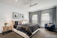  8B Evans Ave Mitcham SA 5062 $1,950,000 - $2,050,000 A Georgian-inspired crowd-pleaser with all the mod cons and a front row seat to Mitcham Reserve. Overlooking the boundless expanses of Mitcham Reserve, this imposingly beautiful two-storey salute to the Georgian residences of a bygone era revels in the newfound freedom, style, quality and push-of-a-button comfort of its comprehensive re-invention. Kudos to the current owner who spared no expense in taking the big bones of an Alan Sheppard creation and transforming them into a light, bright, airy and solar-powered 4-bedroom home that is both prolific and bold, yet understatedly classy. From its professionally landscaped low-care gardens, starring open-plan kitchen and Tasmanian oak floors down to the wiring, plumbing and every door and cornice, what looks and feels brand new from top to toe does because it just about is. Headlined by its high-end appliances, butler’s pantry and an expansive island topped with a 3.2m-long piece of stone, the kitchen is as much a stylish statement as it is a feat in functionality. If you include the entertainer’s patio with an electronic louvred Vergola and an eye on spring dinners, there are four living spaces to call on, one central to an upper floor with two bedrooms, a sleek fully-tiled bathroom and bragging rights for the kids. With a walk-in robe and ensuite, the main bedroom takes the honours in a home decked out in automated mod cons, whether it be the zoned ducted R/C, CCTV, or that bill-busting 6.6KW solar system, just to name a few. A timeless home with the modern way of life in mind. What’s left to think about? More to love: – Just a short stroll from Scotch College – All upgrades completed within the last 18 months – Spanning a wide street frontage, maximising its lush, park views – Double garage with epoxy floors, storage and automated doors to front and rear – Expanded front driveway (for three cars) – Ultra-flexible floorplan includes open-plan living and formal sitting room to ground floor – Landscaping includes aggregate concreting to home’s perimeter – Ducted R/C, ceiling fans and gas feature fireplace – Beautifully presented low-care gardens with mobile phone controlled lighting and watering – Hardwired CCTV with security lighting and motion detection – Storage galore includes built-in robes to bedrooms 1, 2 and 3 – The option to work from home in bedroom 4/office – Custom ‘s-fold’ sheer curtains throughout – Large laundry with custom joinery and stone benchtops – LED down lights throughout the home – Just a moment from the hiking trails of Brown Hill Creek, ‘The Ed’, Mitcham Square and cinema – Walking distance from public transport – And much more. 