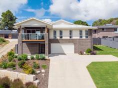  24 Earls Court Goonellabah NSW 2480 $995,000 - $1,045,000 With a commanding street presence, the scale of this home is evident from the moment you arrive. Designed with the large family in mind, the functional layout, quality of construction and the level of finishes will leave you wanting for nothing. Boasting four large bedrooms - the main with his and hers walk in robes, generous ensuite and a stunning outlook, the other bedrooms have built in robes and the home has extra high ceilings throughout giving a real feeling of space. The heart of the home is the open plan, air conditioned, kitchen, dining and lounge area, seamlessly flowing from the kitchen, right through to the front balcony - large enough for a dinner party and taking full advantage of the leafy outlook. The kitchen is stunning with stone tops, island bench and a beautiful pendant light while the chef will love the 900mm freestanding oven and gas cooktop. Storage is a breeze with a large butlers pantry along with appliance bench. The rumpus room to the rear of the home opens directly out onto the covered entertaining area with steps leading to the large flat rear yard, the ideal place for a game of soccer or cricket, space for a trampoline or even a pool. Fully fenced and ideal for pets, there is simply nothing to do. Avoid the delays and uncertainty of building costs - your opportunity to skip the que is right here.. 