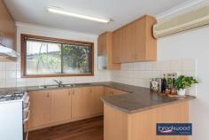  9C John St Midland WA 6056 This 2-bedroom, 1-bathroom property occupies a remarkable 409 sqm lot at the rear of a small unit complex. An open-plan kitchen/meals extends onto a large alfresco entertaining area edged with lawn and a screen of established trees. A rare find in a central location with the atmosphere of a small home, this unit is not to be missed. 2 bedrooms 1 bathroom 1979-built brick and tile Rear small unit complex Open plan kitchen/meals Fully tiled reno’ed bath Big gabled alfresco living Gated two-car carport Reticulated lawn & garden Surprising 409 sqm block Close schools shops transp Boasting the backyard of a small home with a large outdoor entertaining area, lawn, and reticulated gardens, this unit nestles at the rear of a 5-unit complex. Surrounded by greenery, the home features a single carport with gated access to the backyard and a welcoming portico entry. A north-facing window, fresh white walls and rich timber-look laminate floors offer a bright welcome as you step inside the family room. This palette of colours and materials continues in the adjoining kitchen/meals area, creating a visual flow and a sense of cohesion. The kitchen is well-appointed with ample under bench and overhead storage, a U-shaped benchtop with an integrated breakfast bar and a freestanding oven. There is ample space in the meals area for a full-sized table, but this property is designed to encourage alfresco dining. A sliding door opens the kitchen/meals area to a big, beautiful patio sheltered by a high gabled roof. Established plantings along the property’s fence line create a private, secluded space with room for entertaining and an exceptional sense of space Two good-sized bedrooms share the fully-tiled renovated bathroom. An on-trend neutral palette creates a light and airy space with a delightfully modern vibe. Set in a great central location, close to public transport, the Midland Health Campus and Midland Gate shopping centre. St Brigid’s Primary School and the North Metropolitan TAFE are within walking distance of this unit with more. 