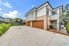  2/11 Prevost Place Macgregor ACT 2615 Nestled at the end of a quiet cul-de-sac in peaceful Macgregor is this modern and very comfortable 3 bedroom townhouse. Backing parkland, this is a rare opportunity to secure a stylish near-new home in an established suburb with all the creature comforts. The interior features a formal entryway leading through to a large open plan kitchen with walk-in pantry, dining and living room which flows out to a fabulous rear deck. The family chef will love cooking up a storm in the stunning kitchen, complete with stone benchtops, pendant lighting, and quality stainless steel appliances. Positioned on the lower level you'll also find the laundry and separate powder room. Ascending upstairs, three light and lovely bedrooms await. However, before you see the bedrooms, you are met by a spacious study. Perfect for working from home or a homework corner. All bedrooms benefit from generous sizing, built in robes and plenty of natural light. The master features its own walk-in robe & ensuite, plus great views over the park. The main bathroom, also upstairs, features a shower & bath, and a separate toilet. Also featuring a lovely outlook of the park is the elevated rear deck off the downstairs living room, which is fully covered for family meals and entertaining. Ducted reverse cycle heating and cooling, instantaneous gas hot water, and a double lock up garage with internal access add to the perks of this lovely home. The popular Magpies Belconnen Golf Club is a short drive up the road, while Kippax Centre and all its amenities are less than a 10-minute walk away. There is easy access to major arterial roads which will take you into the heart of Belconnen and the city. Features: Quiet street backing parkland Only 2 townhouses and a single house on the 1409m2 property, self-managed (low body corporate) Absolutely stunning 6-star energy efficiency rating Elevated timber patio Open plan kitchen, dining and living room Kitchen with gas cooking, stone benchtops, new dishwasher, microwave, island bench Walk in pantry Downstairs powder room Study nook on the upper level Main bedroom with walk in robe, ensuite and park views 2 additional bedrooms with built in robes Stylish main bathroom with separate toilet Laundry with good storage Ducted reverse cycle heating and cooling Fabulous elevated and covered rear deck Fully fenced rear courtyard with grassed area Double lock up garage with internal access Under stair storage NBN connected Easy access to Kippax shopping centre Close to Belconnen (9 minute drive) Less than 20 minutes to the city Walking distance to Macgregor Primary School and Kingsford Smith School 