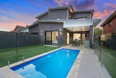  62A Letitia Street Oatley NSW 2223 A rare opportunity to purchase a full brick new home, displaying architectural brilliance, unparalleled in quality, embracing high ceilings and spacious interiors. This exclusive brand new home showcases a striking entry and facade, with emphasis on style and elegance. Complimented by the following features:- * 6 bedrooms with 2 masters enjoying ensuites, balconies and a walk-in robe * Sleek and stylish gas kitchen, with large island, stone bench tops, stainless steel appliances including dishwasher, ample bench and cupboard space * Open plan lounge and dining area flowing onto the undercover entertaining area, enjoying an ideal northerly aspect, with 2nd kitchen, low maintenance gardens * 4 luxurious bathrooms, main enjoys a deep freestanding bath, large laundry with ample storage * Ducted air-conditioning, alarm system * Self-contained studio at rear, own entrance & garden behind The architectural lines effortlessly balance low maintenance contemporary living. There is no denying the grandeur of this home, making it a monument to luxury and design. Truly a must to inspect. 