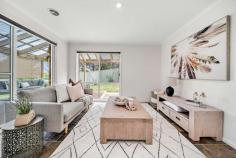  3 Coburn Place Isaacs ACT 2607 For bright and breezy modern living, you can't go past this single level brick beauty! Occupying an elevated position in a wonderfully quiet street, step inside and be impressed by all that's on offer across the home's ample single level. Freshly painted, you will feel an instant sense of calm as large windows allow natural light to stream inside, and the supreme comfort and liveability throughout becomes evident. Two spacious living areas ensure there is plenty of room for families, and a lovely kitchen has everything you'll need to whip up meals with ease. Entertaining will also be effortless with a sizeable alfresco deck sure to be used often as it extends from the interior living spaces. You will love the privacy you are afforded here, especially with a nature reserve as your backdrop. The kids will have a ball on the bike tracks and exploring the bushland surrounds on one of the hiking tracks, and our native wildlife will be among your most regular visitors! Fabulously located with a myriad of leisure and lifestyle conveniences on your doorstep, if you are looking for a home that is ready to move into, call and arrange your inspection today. Features include: Spacious, sunken formal living and dining room Family meals and living area extends to the outdoor entertaining terrace Well-presented kitchen with gas cooktop, wall oven, dishwasher, and pantry Privately placed master bedroom includes a walk-in robe and full ensuite Two further bedrooms share a good-sized family bathroom and separate w/c Home office has the potential to be a fourth bedroom if needed Low-maintenance, fully fenced backyard wraps around the home Ducted gas heating and evaporative cooling Full sized laundry Secure double garage with internal home entry Secure intercom entry Backs onto a nature reserve Rates: $1,980.72pa Land Tax $2,393.95pa (Investment only) Living: 164sqm, Garage: 45.2sqm Close to: Isaacs IGA Swinger Hill Shops Mawson Southland Shops Arterial roads Canberra Hospital Woden Town Centre and amenities Woden cafes, cinemas, restaurants, bars Excellent primary and high schools 