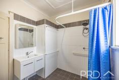  32 Bartoman Street Batlow NSW 2730 $330,000 Positioned to the front of a generous allotment and capitalising on the elevated positioned, you will love this partially renovated four-bedroom home on Bartoman. Offering a flexible layout and fully covered rear entertaining area, perfect for entertaining , it is sure to not last long. Call today to book your inspection! Premiere Features: - Four bedrooms, three with ceiling fans and master boasting triple-built ins, external access, plantation shutters, electric external block out blind and heat transfer unit - Privately positioned bathroom with large shower, updated single vanity and toilet - Updated kitchen with stainless appliances and ample storage options overlooking the deck and rear yard - Central open plan dining off the kitchen and living area - Formal lounge with wood box fire heater, heat transfer unit and ceiling fan - Large mudroom area, accessed via the rear deck with storage options - Internal laundry to the rear of the plan - Large fully covered rear deck with an elevated aspect - Single carport - Single lock up garage - Great sized workshop off the rear of the lock up garage - Ample garden sheds and wood/storage shedding - Great size fully fenced rear yard with vehicle access - Additional under house storage - Fully painted externals - Approximate 7.5Kw solar system with dual converters - 1,012m2 fully fenced allotment 