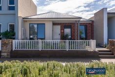  186 Dalmilling Dr The Vines WA 6069 $349,000 Elevated behind a white picket fence and a nature strip that broadens out to merge with a neighbouring park, this 3-bedroom 2-bathroom home is a picture of perfection. The 2020-built brick and iron residence uses an open plan living zone flowing into a sunny, north-facing courtyard to deliver seamless indoor-outdoor living. Nearby parks, walkways, and the Swan Valley’s gourmet delights offer an enviable lifestyle at home and away. 3 bedrooms 2 bathrooms 2020-built brick and iron Indoor-outdoor floorplan OP kitchen living meals Modern colour scheme Central courtyard garden Dble auto enclosed carport Reticulation front & rear 225 sqm “cottage” block Blue ribbon first home A limited palette of colours and materials, a floorplan where shared and private spaces are well defined and a central outdoor living zone fashion a home designed for contemporary living with a sense of welcome and ease. Three bedrooms sit at the front of the floorplan. Two juniors with plush carpet and a wardrobe recess are arranged on either side of a shared family bathroom featuring black tapware and an on-trend colour scheme. The principal bedroom features a pair of tall windows looking across the front garden and paved patio. Completing this oasis of calm is a walk-through robe opening into an ensuite with a shower, vanity, and WC. At the rear of the plan, an expanse of open living merges with a paved courtyard to expand the functional living space. Light-hued timber-look floors and an uber-cool palette of white and charcoal give this central living zone a modern edge. An island bench with an integrated breakfast bar, stone-topped benches and a 900 mm oven with a 5-burner hob will delight the most passionate of cooks. Reverse cycle air-conditioning delivers year-round climate control to the central living zone. The north-facing courtyard is open to the remote entry, 2-car auto enclosed carport. The extra-height carport has clearance for a 4 X 4 and is accessed via a rear laneway. Move-in ready, beautifully presented and a picture-perfect first home, this easy-care, easy-living property is not to be missed. 