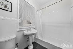  4 Rattle Street NEW TOWN TAS 7008 $975,000 Beautifully renovated throughout, this family home radiates a mixture of modern plus period features. Right from the moment you enter, the vibe is warm and comfortable, complemented with the ducted Daikin reverse cycle air conditioning system, double glazed windows throughout and carpeted bedrooms plus living room. The remainder of the home features hard floors, with large modern tiles in the kitchen and dining area plus tiled bathroom which has recently been updated. The kitchen has modern appliances and two island benches which provide separation from the dining area plus a perfect servery for entertaining. All three bedrooms are spacious, and have built-in wardrobes, the second also has a Murphy bed and toilet with vanity. Sliding barn doors allow separation from the hallway to the kitchen and dining and the walk-in laundry provides plenty of space for extra kitchen appliances and storage. Outside continues to impress, with the plentiful array of raised garden beds with vegetables and fruit trees surrounding, plus two garden sheds for garden equipment to be stored in. A lined studio is perfect for the home office, or retreat with a reverse cycle air conditioner and there is a single garage plus additional off street parking. A tightly held location, in close proximity to shops, schools, cafes and more, this charming home will definitely impress and is well worth an inspection! 