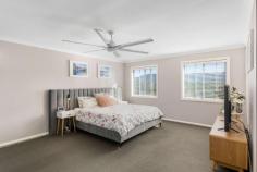  86 Timberi Avenue Dapto NSW 2530 $950,000 - $1,010,000 Introducing you to this immaculate family home that offers an immense amount of space and a great layout for effortless living. Nestled in a peaceful street offering privacy and serenity. This home has been beautifully renovated inside and out. Styled to perfection boasting an open floor plan, offering six generous sized bedrooms plus parents retreat and the perfect entertainment area. Ideal for those in search of a modern residence, located close to an array of schools, surrounded by nature, walking distance to public transport and only moments to Dapto's CBD. This is an opportunity not to be missed! 6 generous bedrooms, 5 with BIW's Two well positioned stylish bathrooms Multiple living areas, both upstairs and downstairs Entertainers kitchen with stone benchtops and quality appliances Covered alfresco entertaining hub with a built-in BBQ Positioned in a leafy street with a great outlook Fully renovated throughout with nothing to do Situated moments to transport, schools and Dapto CBD 