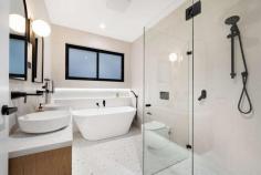  22 Smiths Avenue Hurstville NSW 2220 Placed in an elevated position on a peaceful, wide street this opulent residence is exceptional in its size and appointments, setting a new benchmark for homes in Hurstville. Enjoying a premier northerly rear aspect, it has been exquisitely crafted with not a single detail overlooked and the owner's vision clearly demonstrated through every element. From the moment you first see this home, you are sure to be captivated by the sheer scale of its interiors and long list of high-end fittings and you'll want to call it your own. - Grand entrance with custom front door reveals a dual level floor plan bathed in natural light - Light filled formal lounge starring a double void ceiling, designer pendant light and expansive windows - Open plan living/dining area with gas fire place, bespoke joinery, recessed lighting and curtains - Designer Range quartz kitchen featuring stunning curved island, walk-in pantry and window splashback - Stainless steel Bosch appliances including gas glass cooktop, dual ovens and dishwasher - Five plush bedrooms, all with built-in wardrobes, four on the upper level, three with ensuites - Grand hotel style master suite flows outdoors to sweeping balcony, the perfect parent's retreat - All four chic bathrooms include frameless showers, feature tiles and in-wall toilets, two have freestanding tubs - Home office/study with built-in desk and cabinetry; large laundry with stone benchtop - Generous covered entertaining area with outdoor kitchen overlooks level lawn and sparkling in-ground pool - Separate fully equipped pool cabana, ideal for alfresco entertaining - Double garage with automatic statement door and internal access plus ample space for storage - Ducted air-conditioning throughout, Billie instant hot cold water, security cameras and alarm - Within minutes of quality schools, shops, cafes, restaurants, recreational and transport facilities. 