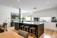  8B Evans Ave Mitcham SA 5062 $1,950,000 - $2,050,000 A Georgian-inspired crowd-pleaser with all the mod cons and a front row seat to Mitcham Reserve. Overlooking the boundless expanses of Mitcham Reserve, this imposingly beautiful two-storey salute to the Georgian residences of a bygone era revels in the newfound freedom, style, quality and push-of-a-button comfort of its comprehensive re-invention. Kudos to the current owner who spared no expense in taking the big bones of an Alan Sheppard creation and transforming them into a light, bright, airy and solar-powered 4-bedroom home that is both prolific and bold, yet understatedly classy. From its professionally landscaped low-care gardens, starring open-plan kitchen and Tasmanian oak floors down to the wiring, plumbing and every door and cornice, what looks and feels brand new from top to toe does because it just about is. Headlined by its high-end appliances, butler’s pantry and an expansive island topped with a 3.2m-long piece of stone, the kitchen is as much a stylish statement as it is a feat in functionality. If you include the entertainer’s patio with an electronic louvred Vergola and an eye on spring dinners, there are four living spaces to call on, one central to an upper floor with two bedrooms, a sleek fully-tiled bathroom and bragging rights for the kids. With a walk-in robe and ensuite, the main bedroom takes the honours in a home decked out in automated mod cons, whether it be the zoned ducted R/C, CCTV, or that bill-busting 6.6KW solar system, just to name a few. A timeless home with the modern way of life in mind. What’s left to think about? More to love: – Just a short stroll from Scotch College – All upgrades completed within the last 18 months – Spanning a wide street frontage, maximising its lush, park views – Double garage with epoxy floors, storage and automated doors to front and rear – Expanded front driveway (for three cars) – Ultra-flexible floorplan includes open-plan living and formal sitting room to ground floor – Landscaping includes aggregate concreting to home’s perimeter – Ducted R/C, ceiling fans and gas feature fireplace – Beautifully presented low-care gardens with mobile phone controlled lighting and watering – Hardwired CCTV with security lighting and motion detection – Storage galore includes built-in robes to bedrooms 1, 2 and 3 – The option to work from home in bedroom 4/office – Custom ‘s-fold’ sheer curtains throughout – Large laundry with custom joinery and stone benchtops – LED down lights throughout the home – Just a moment from the hiking trails of Brown Hill Creek, ‘The Ed’, Mitcham Square and cinema – Walking distance from public transport – And much more. 