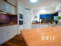  43 Lowan Loop Karawara WA 6152 $1,100,000 What Family Dreams Are Made of! Stunningly neighbouring and overlooking a massive park with a playground for the kids, winding walking paths and so much more, this impeccably-presented 5 bedroom 2 bathroom two-storey home will keep you and your loved ones very happy for many years to come. The front yard is secure and gated so the young ones can play without a worry in the world. Step inside and be greeted by a wonderful dance/theatre room with custom cushioned flooring. Gorgeous double French doors reveal the main open-plan family, dining, games and kitchen area, where most of your casual time will be spent. Also, downstairs are carpeted bedrooms with built-in wardrobes, plus a versatile fifth bedroom-come-study that can be whatever you want it to be. These are all serviced by a contemporary family bathroom with a separate bath and shower, a separate laundry and a separate toilet. Upstairs, a massive carpeted parents’ retreat/master suite has its own ceiling fan, splendid parkland and treetop views to wake up to and a superb ensuite – bubbling spa bath, vanity, separate toilet and all. Outdoors, the family room seamlessly extends to a terrific, pitched patio area for entertaining, right beside a shimmering concrete below-ground swimming pool. An elevated garden courtyard under the trees is simply another relaxing space to sit back and unwind in total tranquillity. Nestled walking distance to shopping and restaurants at Waterford Plaza, cycle paths, day-care, Collier Park Golf Course, George Burnett Leisure Centre & Farmers Market, Curtin University, top schools and Manning Road for easy access into the Cannington industrial area, to Perth Airport or the freeway if travelling west, this sublime property is ideally positioned for living convenience. Something special is waiting for you right here! Other features include, but are not limited to: • Double-door entrance • Corner kitchen pantry • Stainless-steel double-drawer dishwasher • Range hood • Gas cooktop • Separate oven • Glass kitchen splashbacks • Quality kitchen tap fittings • Secure lock-up double/triple garage • Internal shopper’s entry • Wood-burner fireplace in the family room • Gleaming wooden floorboards • 6kW solar power-panel system with a battery-ready connection • Fully-ducted reverse-cycle air-conditioning system • Eight (8) professionally-installed CCTV security cameras with web access • Feature ceiling cornices • Down lights • Time-activated 12V perimeter lighting in the yard • Security doors • Robotic pool cleaner • Attic storage in the garage • 521sqm (approx.) block • Built in 2002 (approx.) 
