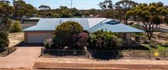  75 James St Goomalling WA 6460 $339,000 - Light and bright Spadaccini built 244sqm brick and colourbond 3 bed, 1.5 bathroom house - Block size 2002sqm - Top end of town overlooking farmland -  Double frontage, level corner block - room for a studio, granny flat, workshop, shed, chooks, vegetable garden or a swimming pool - Three double size bedrooms: built in wardrobe in main bedroom and walk in robes in 2 bedrooms - Spacious bathroom with bath and walk in shower, large powder room separate - Huge open lounge, family, dining, computer nook, generous kitchen with walk in pantry – provision for dishwasher in kitchen cabinetry with plumbing and electrical connections installed - Entry hall/"mudroom" with all purpose built in cupboards. Giant linen cupboard in hall - Large laundry with more inbuilt storage cupboards - Higher than average ceiling height of 2.7m - Electric roller door 2 car garage, with access door into the home. Lots of space on block for several vehicles - Wrap around verandahs on 2 sides - Big 68sqm north facing patio, undercover drying area - Split system airconditioning - New solar hot water system - Near new Masport wood heater - Water saving garden - Fully enclosed yard with new quality colourbond fencing - Close to town infrastructure and amenities - Built in 2000, a much loved and cared for house!!! 