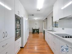  74 Calton Road Gawler East SA 5118 $499,000 - $529,000 Welcome to 74 Calton Road, Gawler East. This beautifully updated home is set back on an expansive 748sqm allotment (approx) and is surrounded by established gardens and other well cared for properties. Residing within walking distance to schools, Gawler’s Main Street, parks and shopping centers this property is the pinnacle of convenience which could create a wonderful lifestyle for any savvy buyer. With its flexible floorplan, feel free to take advantage of a four to five bedroom home, with three separate living areas, updated bathrooms and kitchen, ducted heating and cooling as well as the advantage of drive through access into a rear shed. The property includes; * Large front lounge with fresh floor coverings outlooking the magnificent front garden with roller shutters * The master bedroom includes a walk-in robe and ensuite with floor to ceiling tiling and roller shutters to its front windows * The kitchen with stone look bench tops has plenty of cupboard and bench space with stainless steel appliances * To the other end of the home, three bedrooms surround a private living area and the updated main bathroom. Bedrooms 3 and 4 include built in robes. * The rumpus room is a great entertainment space perfect for year-round entertainment * You have the flexibility of taking advantage of bedroom 5 which can easily be used as a study, business room (STCC) or be converted back to its original garage. * Outside take advantage of the large shed with concrete floor which helps service the manicured gardens - the perfect finish to this wonderful home. 