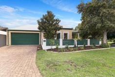  2A Perina Pl Wilson WA 6107 Situated on a green title 320sqm block, an iconic bull-nosed verandah and Florentine brick home offers a slice of heart-warming classic Australiana style. Translating from the homes exterior, the unique and distinctive style continues to be the highlight of this home. With gleaming hardwood floors to transport you through the homes functional floorplan, this property will just keep giving. A beautiful family sized kitchen with a characteristic and heartwarming country style finish complete with Belfast sink and subway tiles, you’ll enjoy cooking up a storm to impress your guests. To the homes main bathroom featuring a freestanding clawfoot tub ready and waiting for you to soak away your worries. Entertain in the outdoor undercover alfresco or enjoy a cozy movie by the homes gas fireplace in the lounge. The home’s queen sized master bedroom with adjoining powder room and walk in robe, secondary queen sized bedroom and built-in-robe, and third guest bedroom or study, will easily suit as the perfect down sizer, a young professional couple seeking a bit of extra space, or many more. Situated in the riverside suburb of Wilson, you can enjoy the impeccable value on offer whilst remaining well connected to Perth’s major transport corridors, shopping centers, nature and wildlife. Key Features: • Classic Australian style home • Florentine brickwork and beautiful bull-nosed verandah • 2 Queen sized bedrooms and a third guest room or study • Country style kitchen with Belfast sink and gas cooktop • Low traffic cul-de-sac • Vintage Australiana Picket Fence • Freshly painted throughout • Undercover outdoor entertaining through double French doors leading off the dining space. • Plantation shutters throughout • Ducted air conditioning Location: • 100m to Canning River Regional Park • 2.4km to Westfield Carousel Shopping and Entertainment Complex • 2.7km to Curtin University • 5.9km to Freeway on Ramp (via Manning Road) • 850m to Wilson Primary School • 2.6km to Cannington Community College (Local Catchment Area) 