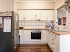  32 Fischer Street Goonellabah NSW 2480 $625,000 This three bedroom home constructed of stucco exterior with a brick base, has undergone a mini makeover with the installation of a new kitchen featuring timber benchtops and modern appliances. The stunning hardwood floors have been rejuvenated and add a real warmth to the home. Each bedroom comes with built in wardrobes whilst the original bathroom is neat and tidy. The combined lounge/dining area has reverse cycle air conditioning and to the rear of the home is an East facing sunroom and laundry. Set on a leafy, fully fenced allotment, an added bonus is the side access leading to the large 10m x 7.5m (approx) shed/workshop complete with power, water and toilet facilities - ideal for extra vehicles or the tradesman. This convenient location is handy to neighbourhood shops, medical centres, schools and sporting fields. 