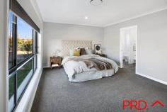  4 Bluebell Way Tamworth NSW 2340 Here is your once-in-a-lifetime opportunity to secure this impeccably presented residence with a commanding first impression. Beautiful and spacious, both inside and out this stunning home offers a superbly designed floor plan to accommodate a large family. Upon entering the home, attention is drawn to the high quality fittings and premium finishes. The interior features include 4 spacious bedrooms all with built-in robes, 2 living spaces including a private media room. The master suite is a luxurious haven and is partnered with a spacious ensuite and large walk-in wardrobe. The gourmet kitchen is of grand proportions offering an abundance of natural light, with a large butler's pantry adding a practical edge to the beautifully crafted kitchen to swoon over. The open plan living space offers a designated dining zone flowing through to the outdoor area, where families can gather for meals and play. The designer main bathroom has a sense of grandeur that will instantly take your breath away, incorporating a generous vanity area with twin basins also featuring a gorgeous standalone tub and oversized shower. Other highlights in this thoughtfully crafted and luxurious home include a private studio with its own separate toilet, this space perfect is to utilize as an office or 5th bedroom/teenagers retreat and an abundance of storage throughout the home. Also offering secured parking for 2 cars with internal access to the home, a 2 bay colourbond shed with additional carport - perfect to park a caravan or boat. The property also boasts established citrus trees and manicured landscaping that can be watered at the push of a button on your phone or can be set to automatic watering. Every element in this home has been thoughtfully designed to exuded comfort, sophistication and family-first living, located in a blue chip suburb within a short distance to the CBD of Tamworth this home is perfect for the growing family. 