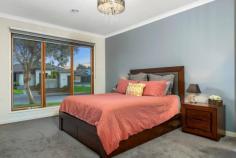  15 Palomino Ave Clyde North VIC 3978 $850,000 - $900,000 Exemplifying space and quality throughout, this Henley built home will not disappoint. Warmly welcomed by the brick and render façade and landscaped gardens, it only gets better once you step through the front door. Greeted with an extra wide hallway, spotted gum timber flooring, and the luxurious master suite to your left, this property will instantly feel like home. The master suite is ultra-spacious and features timber framed windows, a huge WIR, an enormous ensuite with separate shower, separate bath, and double his and her vanities, all making this space the ultimate parents' retreat. Continuing through the home you will notice a double door entry to your very own home office or third living space, before being presented with the heart of the home; the main living, dining and kitchen. A true chef's kitchen, boasting a 1200mm wide island with 40mm stone benchtops, 900mm oven and gas cooktop, stainless steel dishwasher, built in pantry, and plumbing to the fridge space. Surrounding the dreamy kitchen is your expansive and open plan living and dining. The living room has plenty of space for the whole family to tuck in and watch their favourite movies, while the dining space is light and airy and leads you to your alfresco via timber stacker doors. The picture perfect alfresco is perfect for year-round entertaining as the backyard features a northern aspect. With quality timber decking, blinds to keep you sheltered from the weather and grassed surrounds, it is the ideal spot for those summer BBQ's. The home also boasts a rear positioned theatre room, 3 further oversized bedrooms all with BIR's, family bathroom, powder room, a functional laundry, and an oversized double garage with rear roller door, providing an abundance of storage. Features: - Huge 1200mm kitchen island with 40mm stone benchtops - Feature timber windows and timber stacker doors - Massive 576sqm block with north facing yard - Luxurious master suite and ensuite featuring double vanities and separate bath - Spotted gum timber hardwood flooring throughout - Two distinct living zones and a study/third living - Zoned ducted heating and split system A/C to living and ensuite - Extra wide double garage with rear roller door and internal access - Alarm system and security cameras Conveniently located with Clyde Grand Reserve Playground only one house down, Selandra Rise Shopping Complex a 1-minute drive away, and Wilandra Rise Primary School and St Peter's College only an approximate 2 minutes' drive away, the lifestyle on offer doesn't get much better than this! You're also only a 3-minute walk away from the 798-bus route which takes you through to the Selandra Rise Shopping Complex, Casey Fields, Cranbourne Station, and the Cranbourne Park Shopping Centre. 