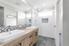  29 PATRICIA CIRCUIT MIRANI QLD 4754 $549,000 Enjoy rural living in modern comfort, just a half-hour drive from Mackay & only a few minutes' drive to Marian Town Centre Shopping Centre and all services in nearby Marian. This "nearly brand new" home was constructed by the highly regarded Hotondo Homes builders in 2020. The stunning inground pool has a waterfall, adjustable lighting, cover & heating & has just been completed recently! Enjoy mountain views all year round while relaxing in this magnificent pool! The entire home has been designed around the needs of a busy, growing family with fantastic flow & clever design elements in a well-thought-out floorplan where every member of the family 'has their own space'. The open plan kitchen, lounge & dining acts as the central hub of the home, flowing seamlessly to the outdoor entertaining area, which you also catch glimpses of through the stunning kitchen glass splashback that allows lots of natural light to flood the area! The luxurious Butler's Kitchen flows from the kitchen & then into the laundry, with direct access to outside - cook dinner, put on a load of washing & water the garden all within the immediate vicinity! The highly efficient office nook is also perfectly located, steps from the kitchen, & is central enough to keep an eye over homework or send quick emails. All materials used in the construction of this home create warmth & texture with marble-look benchtops, timber-look cabinetry, cosy carpets in the bedrooms & tiled floors in the high traffic areas. All 4 bedrooms are built in, air conditioned & carpeted with the Master Suite offering a spacious walk-in robe and modern, tiled ensuite with walk-in shower and double vanity, complete with an extravagantly sized mirror. The main bathroom contains separate bath and shower. For convenience and privacy, there is a separate toilet adjacent to the bathroom. Outside, enjoy stunning mountain views in the large, private, pet-friendly, fully-fenced backyard contains a new inground pool, complete with shade umbrella & still offers potential for new gardens or a massive shed that would be supported by wide side gate access. Be very quick to inspect as this stunning, almost brand-new home is All Done! Move straight in without waiting for builders & enjoy all of the hard work already being done for you! 
