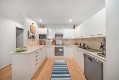  4a Cabin Close Salamander Bay NSW 2317 Set in an ultra-popular suburb of Salamander Bay in a friendly family street close to shops and schools, this single level three bedroom home is sure to impress. The cleverly designed and well orientated floor plan provides natural light filled living, ideal for both casual and formal living, whilst the functional kitchen offers great meal preparation, space and storage. This home offers ducted air conditioning, modern floor boards and downlights, plus a single lock up garage to ensure all your needs are met! A standout of the property is the spacious timber entertaining deck which overlooks the beautiful tranquil native bush that sits at the rear of the home. Here, you can entertain friends and family all year round, host a summer BBQ or enjoy your morning coffee in this peaceful location. Not only does this home highlight low maintenance living, it is positioned close to shops, schools, parklands and is only a short 5 minute drive to Bagnalls Beach. Put this home at the top of your list, the perfect package does exists and this home is it!  
