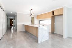  29 PATRICIA CIRCUIT MIRANI QLD 4754 $549,000 Enjoy rural living in modern comfort, just a half-hour drive from Mackay & only a few minutes' drive to Marian Town Centre Shopping Centre and all services in nearby Marian. This "nearly brand new" home was constructed by the highly regarded Hotondo Homes builders in 2020. The stunning inground pool has a waterfall, adjustable lighting, cover & heating & has just been completed recently! Enjoy mountain views all year round while relaxing in this magnificent pool! The entire home has been designed around the needs of a busy, growing family with fantastic flow & clever design elements in a well-thought-out floorplan where every member of the family 'has their own space'. The open plan kitchen, lounge & dining acts as the central hub of the home, flowing seamlessly to the outdoor entertaining area, which you also catch glimpses of through the stunning kitchen glass splashback that allows lots of natural light to flood the area! The luxurious Butler's Kitchen flows from the kitchen & then into the laundry, with direct access to outside - cook dinner, put on a load of washing & water the garden all within the immediate vicinity! The highly efficient office nook is also perfectly located, steps from the kitchen, & is central enough to keep an eye over homework or send quick emails. All materials used in the construction of this home create warmth & texture with marble-look benchtops, timber-look cabinetry, cosy carpets in the bedrooms & tiled floors in the high traffic areas. All 4 bedrooms are built in, air conditioned & carpeted with the Master Suite offering a spacious walk-in robe and modern, tiled ensuite with walk-in shower and double vanity, complete with an extravagantly sized mirror. The main bathroom contains separate bath and shower. For convenience and privacy, there is a separate toilet adjacent to the bathroom. Outside, enjoy stunning mountain views in the large, private, pet-friendly, fully-fenced backyard contains a new inground pool, complete with shade umbrella & still offers potential for new gardens or a massive shed that would be supported by wide side gate access. Be very quick to inspect as this stunning, almost brand-new home is All Done! Move straight in without waiting for builders & enjoy all of the hard work already being done for you! 